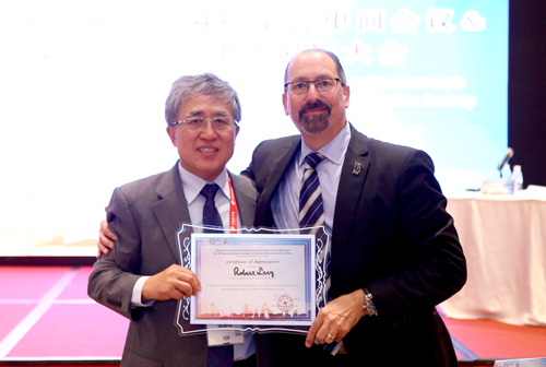 Guoming Luan, MD, PhD, with Robert Levy, MD, PhD